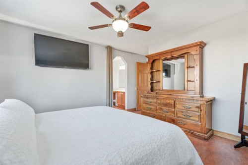 303 Drake Landing Close, Okotoks, AB - Indoor Photo Showing Bedroom
