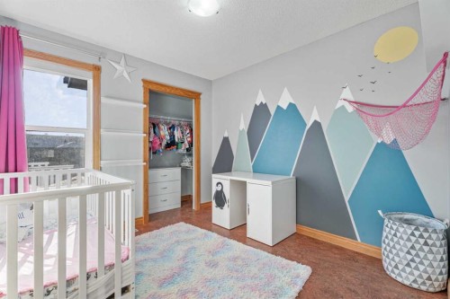 303 Drake Landing Close, Okotoks, AB - Indoor Photo Showing Bedroom
