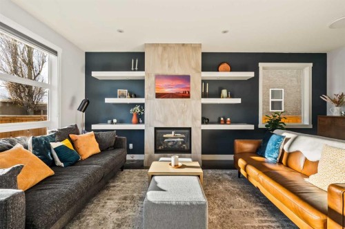 447B 23 Avenue Nw, Calgary, AB - Indoor Photo Showing Living Room With Fireplace