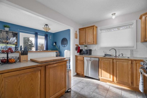 3 Booth Crescent, Irricana, AB - Indoor Photo Showing Kitchen With Double Sink
