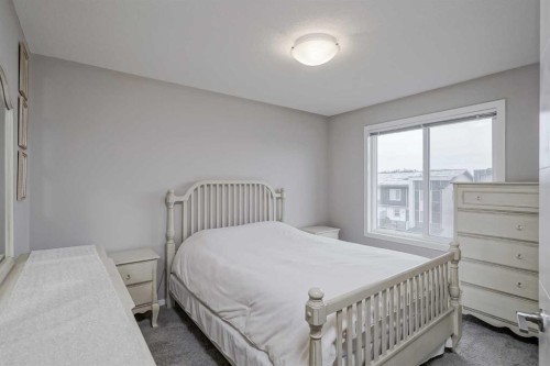 203-130 Redstone Walk Ne, Calgary, AB - Indoor Photo Showing Bedroom