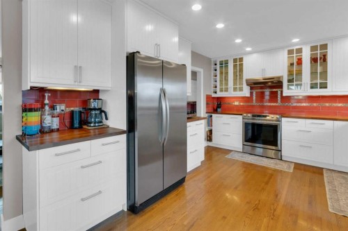 724 Mapleton Drive Se, Calgary, AB - Indoor Photo Showing Kitchen With Upgraded Kitchen