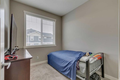 659 Evanston Manor Nw, Calgary, AB - Indoor Photo Showing Bedroom