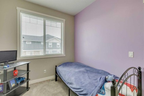 659 Evanston Manor Nw, Calgary, AB - Indoor Photo Showing Bedroom