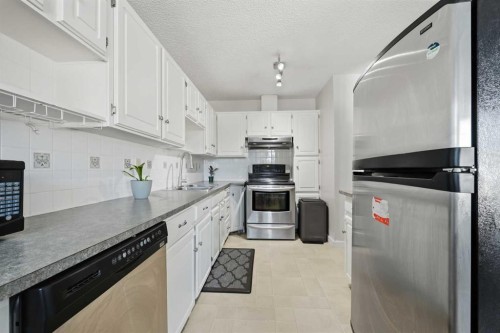 923 Marcombe Drive Ne, Calgary, AB - Indoor Photo Showing Kitchen