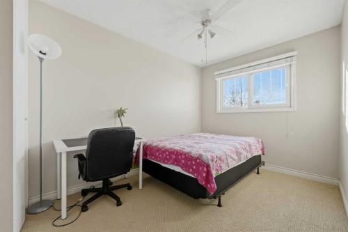 923 Marcombe Drive Ne, Calgary, AB - Indoor Photo Showing Bedroom