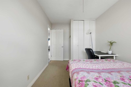 923 Marcombe Drive Ne, Calgary, AB - Indoor Photo Showing Bedroom
