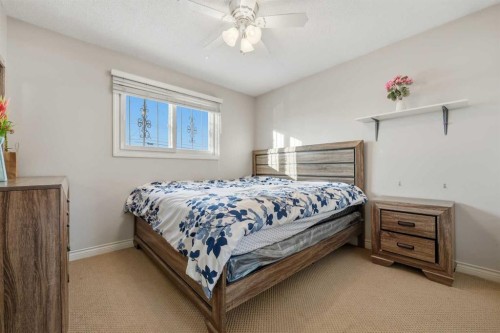 923 Marcombe Drive Ne, Calgary, AB - Indoor Photo Showing Bedroom