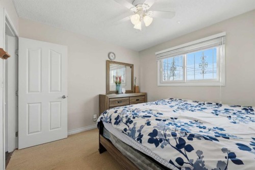 923 Marcombe Drive Ne, Calgary, AB - Indoor Photo Showing Bedroom