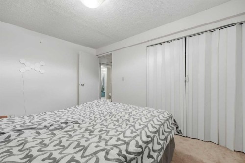 923 Marcombe Drive Ne, Calgary, AB - Indoor Photo Showing Bedroom