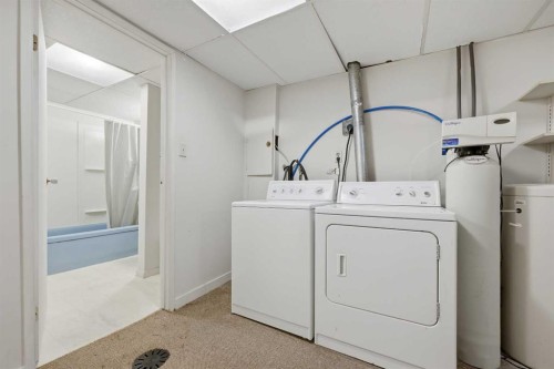 923 Marcombe Drive Ne, Calgary, AB - Indoor Photo Showing Laundry Room