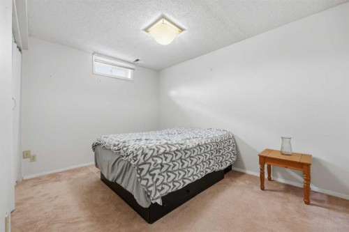 923 Marcombe Drive Ne, Calgary, AB - Indoor Photo Showing Bedroom
