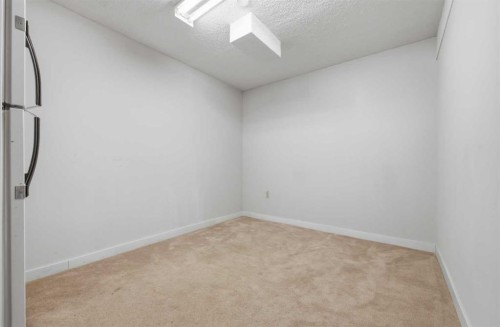 923 Marcombe Drive Ne, Calgary, AB - Indoor Photo Showing Other Room