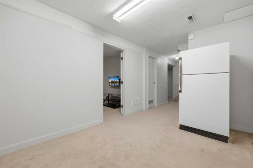 923 Marcombe Drive Ne, Calgary, AB - Indoor Photo Showing Other Room