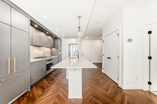 410-8505 Broadcast Avenue Sw, Calgary, AB - Indoor Photo Showing Kitchen With Upgraded Kitchen