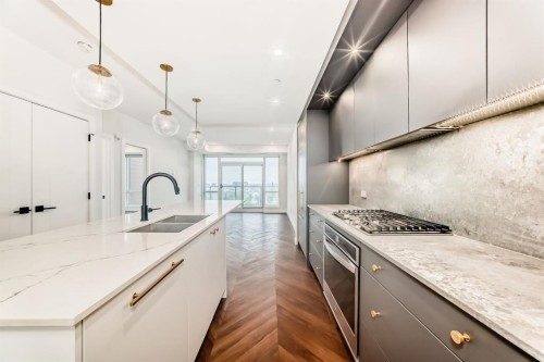 410-8505 Broadcast Avenue Sw, Calgary, AB - Indoor Photo Showing Kitchen With Double Sink With Upgraded Kitchen