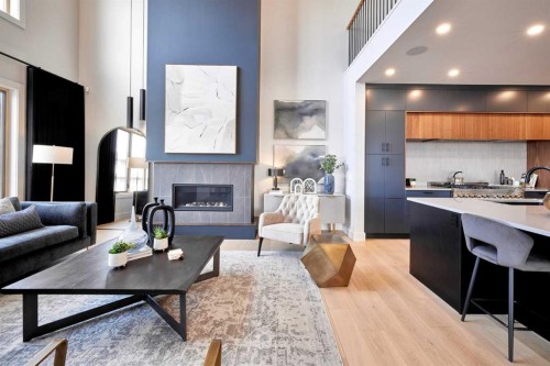 218 Aspen Summit Place Sw, Calgary, AB - Indoor Photo Showing Living Room With Fireplace