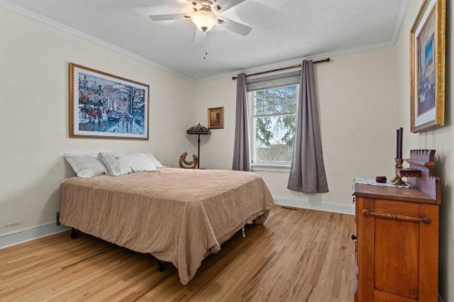656 Royalite Way Se, Diamond Valley, AB - Indoor Photo Showing Bedroom
