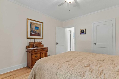 656 Royalite Way Se, Diamond Valley, AB - Indoor Photo Showing Bedroom
