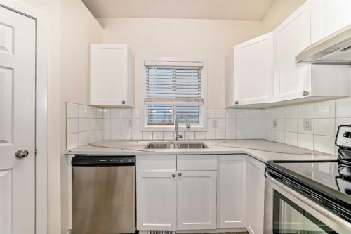 92 Martha'S Haven Gardens Ne, Calgary, AB - Indoor Photo Showing Kitchen With Double Sink