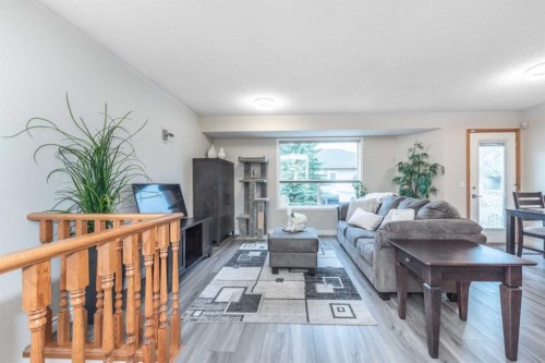 136 Mt Aberdeen Manor Se, Calgary, AB - Indoor Photo Showing Living Room