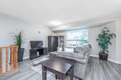 136 Mt Aberdeen Manor Se, Calgary, AB - Indoor Photo Showing Living Room