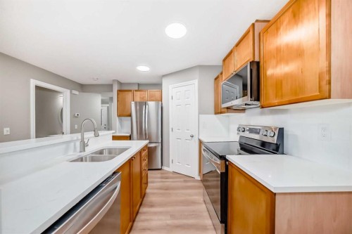30 Citadel Estates Manor Nw, Calgary, AB - Indoor Photo Showing Kitchen With Stainless Steel Kitchen With Double Sink