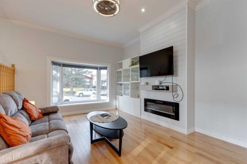 55 Bermuda Place Nw, Calgary, AB - Indoor Photo Showing Living Room With Fireplace