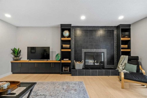 92 Deermeade Road Se, Calgary, AB - Indoor With Fireplace