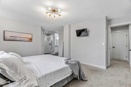 92 Deermeade Road Se, Calgary, AB - Indoor Photo Showing Bedroom