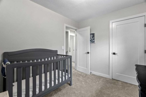 92 Deermeade Road Se, Calgary, AB - Indoor Photo Showing Bedroom
