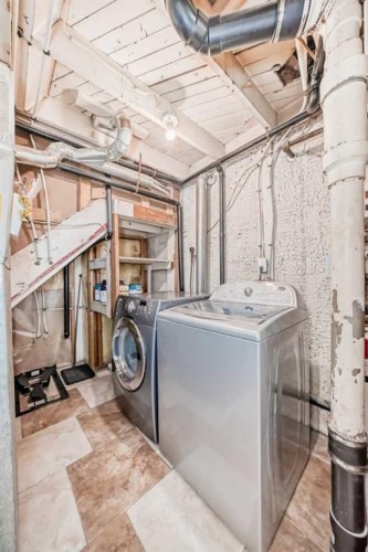 3042 31A Street Se, Calgary, AB - Indoor Photo Showing Laundry Room