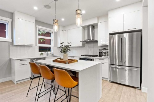 1-705 Mcdougall Road Ne, Calgary, AB - Indoor Photo Showing Kitchen With Stainless Steel Kitchen With Upgraded Kitchen