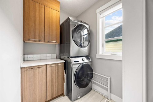 1-705 Mcdougall Road Ne, Calgary, AB - Indoor Photo Showing Laundry Room