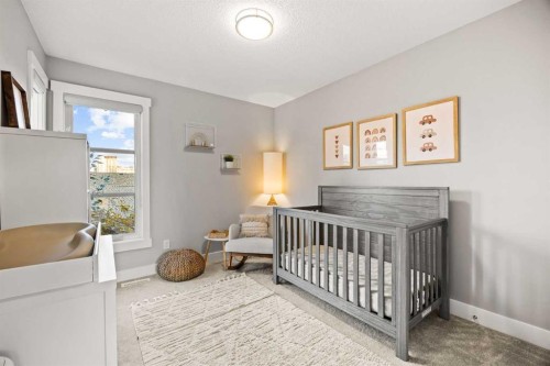 1-705 Mcdougall Road Ne, Calgary, AB - Indoor Photo Showing Bedroom