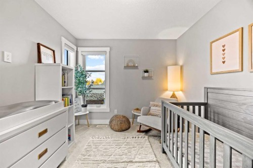 1-705 Mcdougall Road Ne, Calgary, AB - Indoor Photo Showing Bedroom