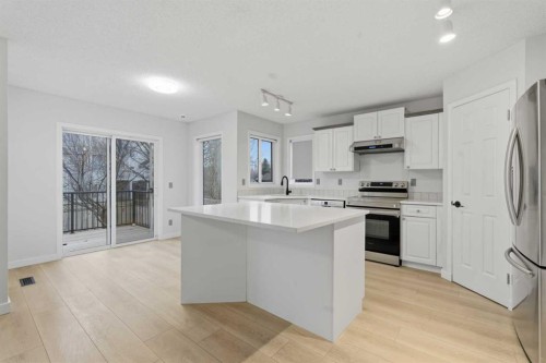 210 Douglas Glen Point Se, Calgary, AB - Indoor Photo Showing Kitchen With Stainless Steel Kitchen