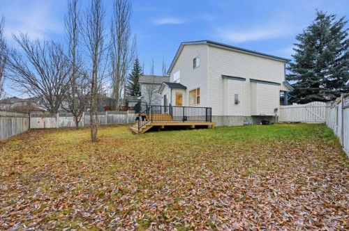 210 Douglas Glen Point Se, Calgary, AB - Outdoor With Deck Patio Veranda With Backyard