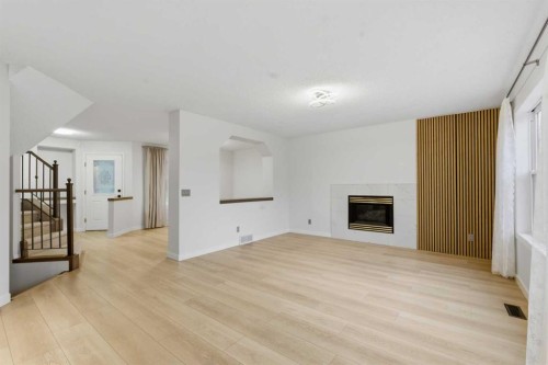 210 Douglas Glen Point Se, Calgary, AB - Indoor With Fireplace