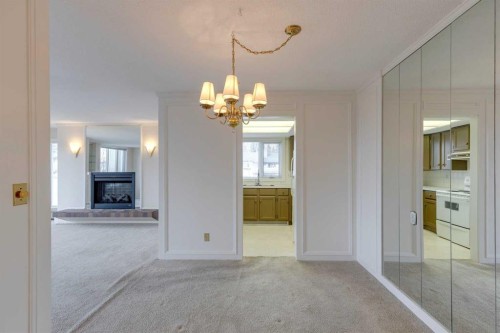 206-3737 42 Street Nw, Calgary, AB - Indoor Photo Showing Other Room With Fireplace