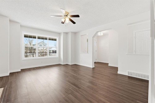 82 Bridleridge Way Sw, Calgary, AB - Indoor Photo Showing Living Room