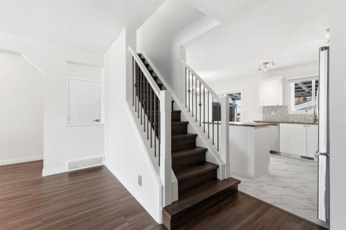 82 Bridleridge Way Sw, Calgary, AB - Indoor Photo Showing Other Room