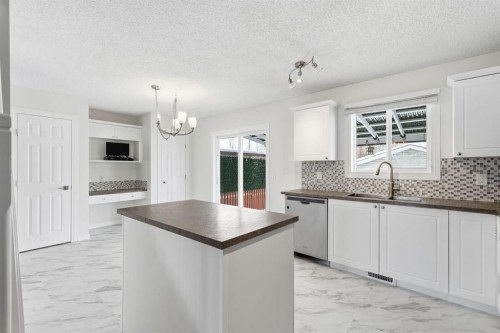 82 Bridleridge Way Sw, Calgary, AB - Indoor Photo Showing Kitchen