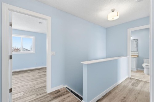 82 Bridleridge Way Sw, Calgary, AB - Indoor Photo Showing Other Room