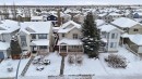 82 Bridleridge Way Sw, Calgary, AB  - Outdoor With Facade 