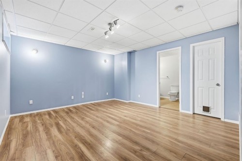 82 Bridleridge Way Sw, Calgary, AB - Indoor Photo Showing Other Room