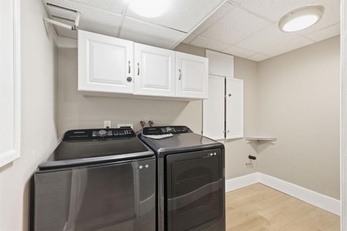 82 Bridleridge Way Sw, Calgary, AB - Indoor Photo Showing Laundry Room