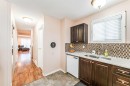 6640 Temple Drive Ne, Calgary, AB  - Indoor Photo Showing Kitchen With Double Sink 
