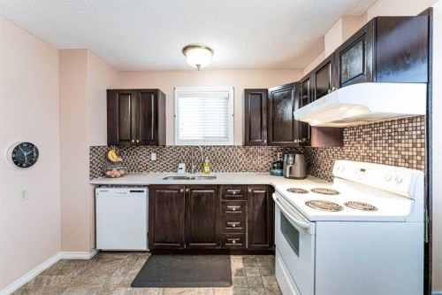 6640 Temple Drive Ne, Calgary, AB - Indoor Photo Showing Kitchen With Double Sink
