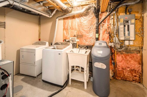 311 Coventry Circle Ne, Calgary, AB - Indoor Photo Showing Laundry Room
